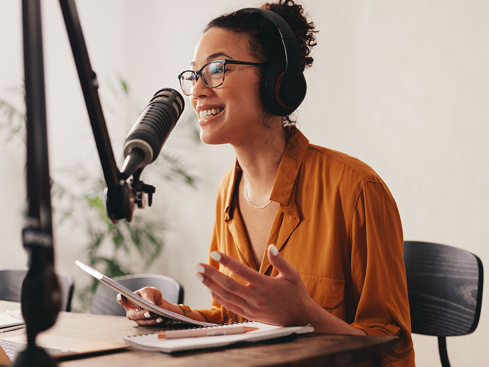 Woman recording a podcast